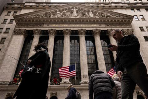 Stock market today: Wall Street ends higher ahead of the final Federal Reserve meeting of the year